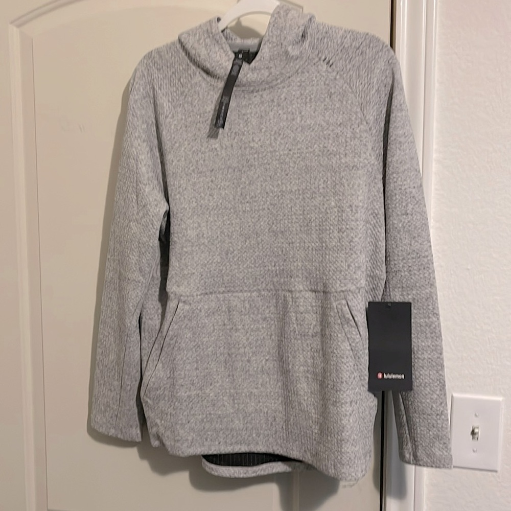 Lululemon, new with tags,  Men’s At Ease Hoodie, size small,  light grey